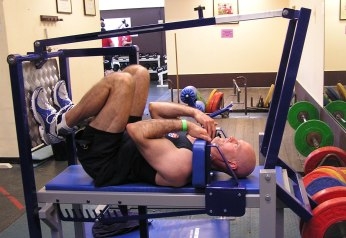 Martin Harland in start position of the MyoThrusta hip and knee extensor strength developer